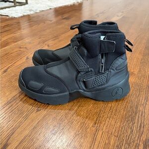 Men’s Jordan Trunner LX High in the Triple Black, size 10.5